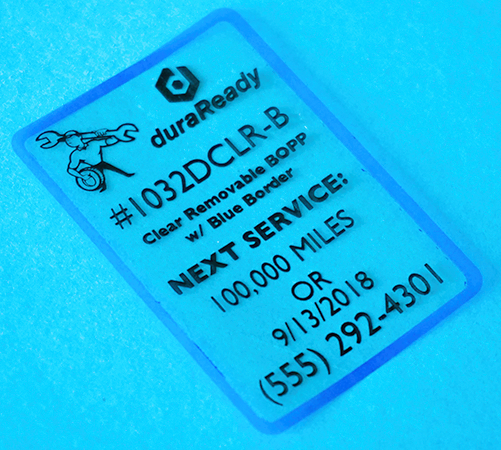 1032DCLRX-B 1.75 x 2.5" Clear Removable Label w Blue Border Large Roll